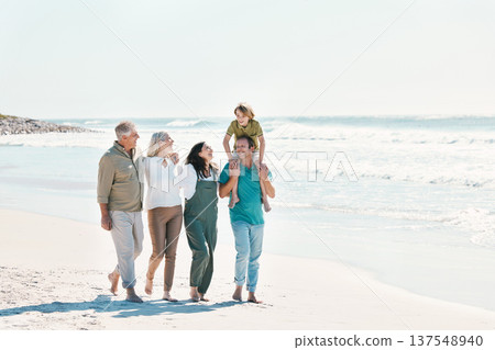 Relax, travel and walking with big family on the beach for support, summer vacation or bonding. Freedom, health and love with people on seaside holiday for adventure, trust or happiness together 137548940