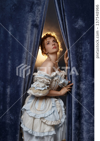 Actress Gazes Upward. Elegant Actress Gazes Upwards With Longing And Gentle Illumination Actress Gazes Upward. Elegant Actress Gazes Upwards With Longing And Gentle Illumination 137548966