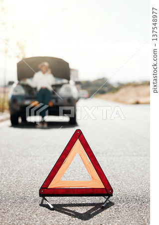 Car problem, stop sign or driver with stress or anxiety late from engine crisis on road or street. Blur, phone call or frustrated black woman talking by a stuck motor vehicle in emergency or accident 137548977