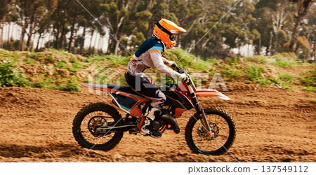 Motorcycle, training and speed with a sports man on space in the forest for dirt biking. Bike, fitness and power with a person driving fast on an off road course for freedom, challenge or performance Motorcycle, training and speed with a sports man on space in the forest for dirt biking. Bike, fitness and power with a person driving fast on an off road course for freedom, challenge or performance 137549112