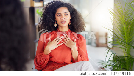 Woman patient talking in therapy session, counseling or psychology for stress, anxiety or mental health advice. Client or person speaking to psychologist, therapist or professional meeting for help 137549116
