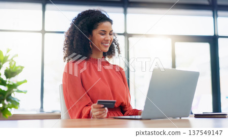 Laptop, office and business woman with credit card for internet purchase, payment and online shopping. Fintech, ecommerce and happy female worker on computer for digital banking, invest and finance 137549147