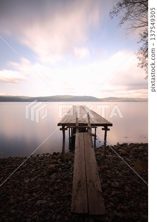 a pier on the lake a pier on the lake 137549305