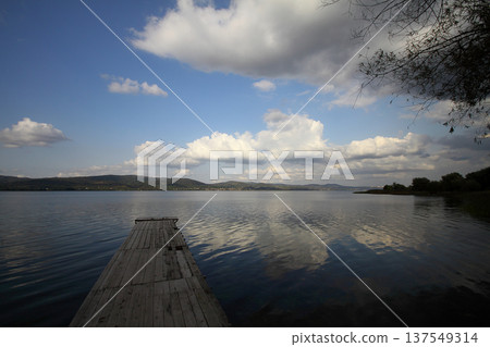 a pier on the lake a pier on the lake 137549314