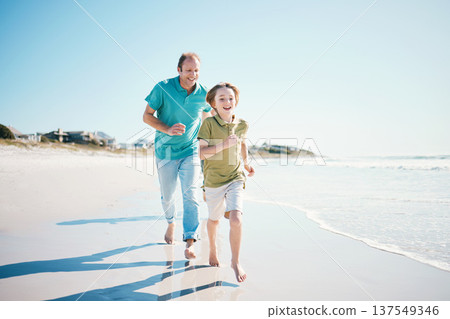 Running, games and happy with family on beach for energy, freedom and summer vacation. Love, relax and adventure with people playing on seaside holiday for health, bonding and travel together 137549346