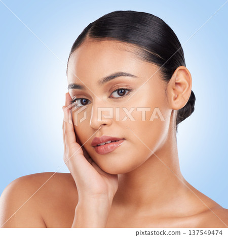 Beauty, makeup and product with portrait of woman in studio for cosmetics, glow and self care. Health, skincare and dermatology with person on blue background for facial, salon and cosmetology Beauty, makeup and product with portrait of woman in studio for cosmetics, glow and self care. Health, skincare and dermatology with person on blue background for facial, salon and cosmetology 137549474