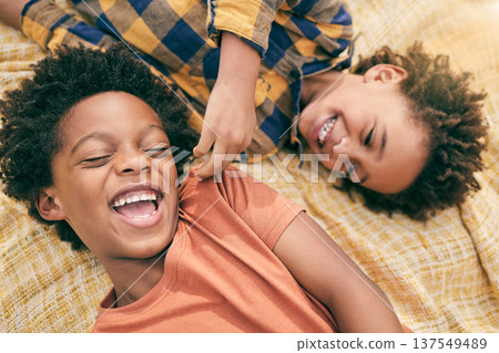 Boy, children and outdoor in park, picnic or top view for love, care or bonding to relax in sunshine. African siblings, kids and happy in garden, comic and funny game for smile, summer and holiday Boy, children and outdoor in park, picnic or top view for love, care or bonding to relax in sunshine. African siblings, kids and happy in garden, comic and funny game for smile, summer and holiday 137549489