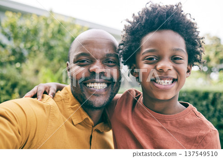 Portrait, father and child take a selfie in nature as a happy family to relax on holiday together. Smile, faces or African dad taking picture or photograph with an excited young boy or kid in park 137549510