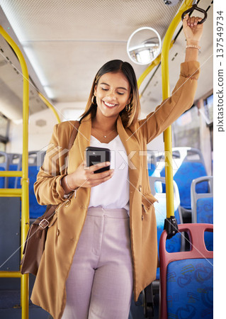 Bus, happy woman and phone with public transport, social media scroll and smile with business commute. City travel, stop and internet app of a female professional on a mobile with networking on metro Bus, happy woman and phone with public transport, social media scroll and smile with business commute. City travel, stop and internet app of a female professional on a mobile with networking on metro 137549734