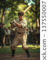 Baseball player prepares to swing at a pitch on a sunny day in a historic setting 137550007