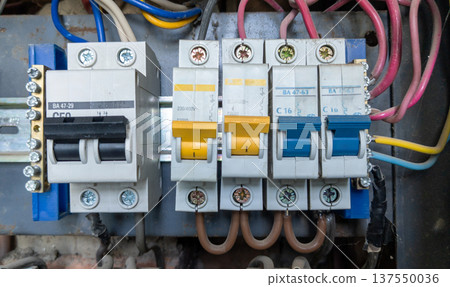Fuses in the electrical distribution board. Distribution board with fuses or circuit breakers in an apartment building. 137550036