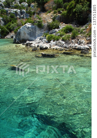 A small seaside town Antalya. Flooded ancient Lycian city as a result of the earthquake city. Near the city of Simena in the vicinity of Kekova Turkey. A small seaside town Antalya. Flooded ancient Lycian city as a result of the earthquake city. Near the city of Simena in the vicinity of Kekova Turkey. 137551805