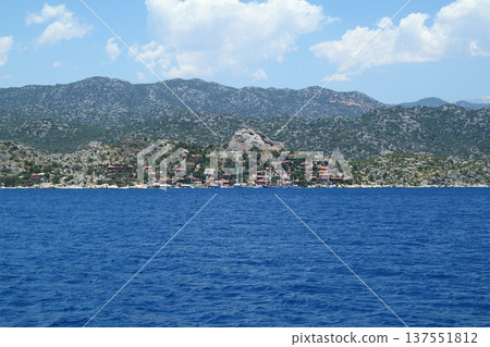 A small seaside town Antalya. Flooded ancient Lycian city as a result of the earthquake city. Near the city of Simena in the vicinity of Kekova Turkey. A small seaside town Antalya. Flooded ancient Lycian city as a result of the earthquake city. Near the city of Simena in the vicinity of Kekova Turkey. 137551812