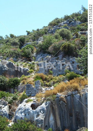 A small seaside town Antalya. Flooded ancient Lycian city as a result of the earthquake city. Near the city of Simena in the vicinity of Kekova Turkey. A small seaside town Antalya. Flooded ancient Lycian city as a result of the earthquake city. Near the city of Simena in the vicinity of Kekova Turkey. 137551822