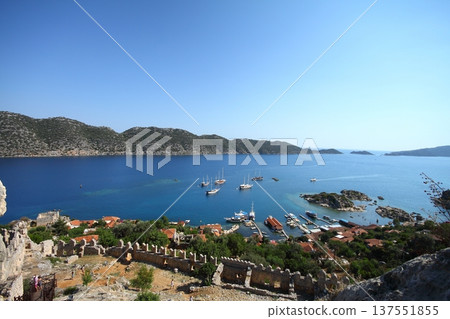 Simena (Kalekoy) ancient ruin site with sarcophagus by historic Simena castle, Turkey by Kekova islands. 137551855