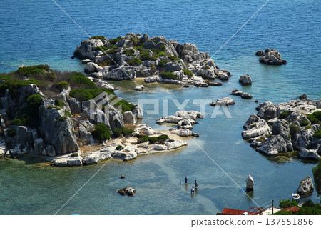Simena (Kalekoy) ancient ruin site with sarcophagus by historic Simena castle, Turkey by Kekova islands. 137551856