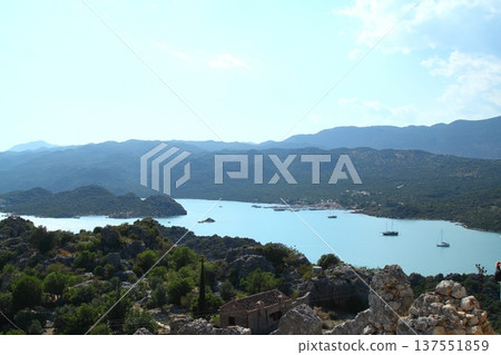 A small seaside town Antalya. Flooded ancient Lycian city as a result of the earthquake city. Near the city of Simena in the vicinity of Kekova Turkey. A small seaside town Antalya. Flooded ancient Lycian city as a result of the earthquake city. Near the city of Simena in the vicinity of Kekova Turkey. 137551859