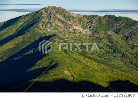 Morning view of Mt. Kurobegoro from the ridge of Mt. Sugoroku in the Northern Alps Morning view of Mt. Kurobegoro from the ridge of Mt. Sugoroku in the Northern Alps 137551907