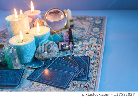 Tarot cards, crystals, and candles for divination 137552027
