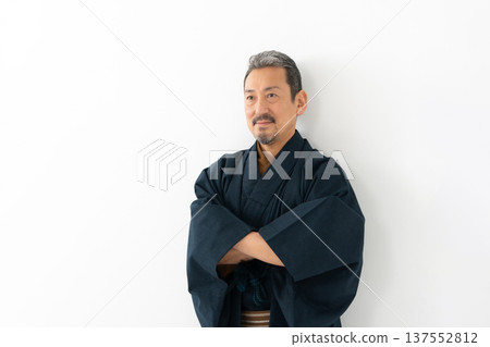 A man wearing a kimono A man wearing a kimono 137552812