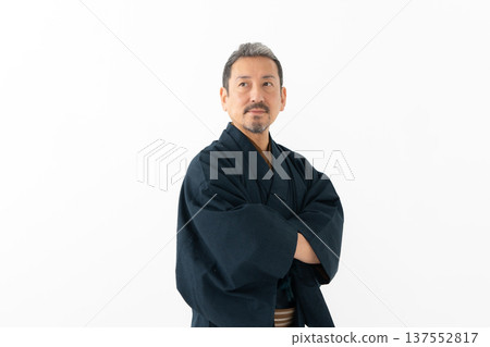 A man wearing a kimono A man wearing a kimono 137552817
