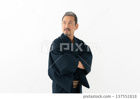 A man wearing a kimono A man wearing a kimono 137552818