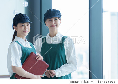 Portrait of a female employee working at a restaurant Portrait of a female employee working at a restaurant 137553395