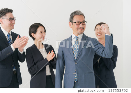 Delighted business people Delighted business people 137553792