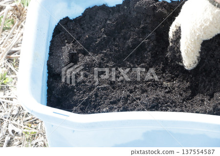 Bark compost spreading Bark compost spreading 137554587