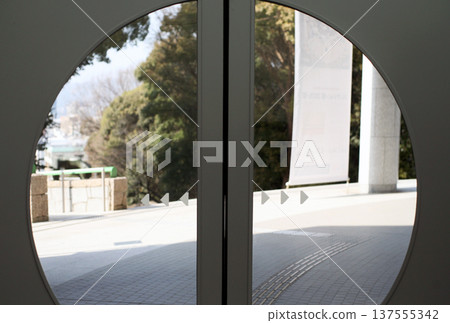 Round window in automatic door Round window in automatic door 137555342