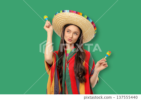 A young woman celebrates Cinco de Mayo joyfully A young woman celebrates Cinco de Mayo joyfully 137555440