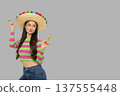 A young woman celebrates Cinco de Mayo joyfully 137555448