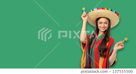 Cinco de Mayo, Woman in traditional outfit smiles with maracas Cinco de Mayo, Woman in traditional outfit smiles with maracas 137555500