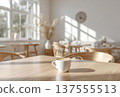 A bright cafe with a white and wood grain theme 137555513