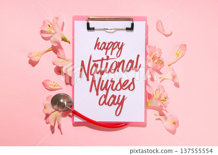 Nurses Day, Clipboard with a nurses message and flowers Nurses Day, Clipboard with a nurses message and flowers 137555554