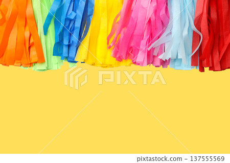 Colorful paper streamers hang in celebration of Cinco de Mayo Colorful paper streamers hang in celebration of Cinco de Mayo 137555569