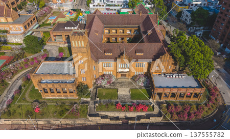 Historic brick school building surrounded by trees in Hong Kong March 8 2026 Historic brick school building surrounded by trees in Hong Kong March 8 2026 137555782