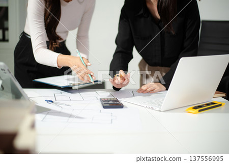 Business people having consultation about wind energy at company office. Asian industry professional team. 137556995