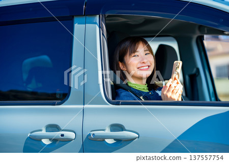 Woman on a road trip 137557754