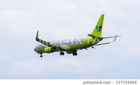 Rear view of a Jin Air plane just before landing 137558988