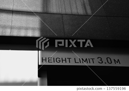 Parking lot entrance sign with a height limit of 3.0m Parking lot entrance sign with a height limit of 3.0m 137559196