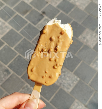 Creamy, smooth ice cream with rich flavor and a melt in your mouth texture, offering a perfect sweet treat to cool down and indulge in every delicious, refreshing scoop. Creamy, smooth ice cream with rich flavor and a melt in your mouth texture, offering a perfect sweet treat to cool down and indulge in every delicious, refreshing scoop. 137559574