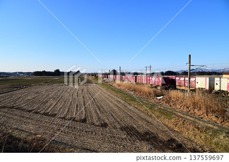 Morning freight train on the Tohoku Main Line Morning freight train on the Tohoku Main Line 137559697