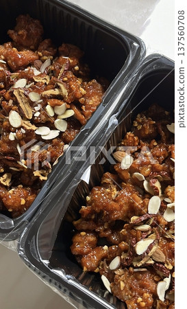 Crispy fried chicken with golden, crunchy skin and juicy, tender meat. A delicious and savory dish, perfect for any meal, served with dipping sauces or side dishes for extra flavor! 137560708