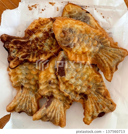 Bungeoppang, bungeo-ppang (Korean Fish Shaped Pastry), popular snack, cookies, sweet in winter streets of Korea. Bungeoppang Korean traditional national food, dish, cuisine. Japanese taiyaki 137560713