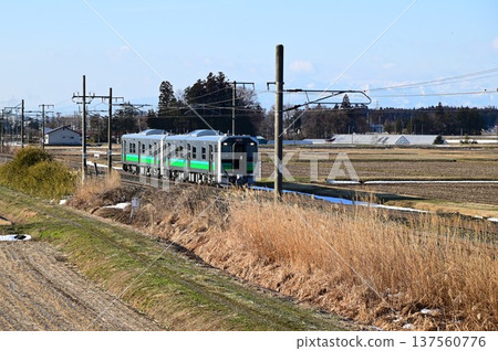 Tohoku Main Line in the morning. New HB-E220 series diesel car. Tohoku Main Line in the morning. New HB-E220 series diesel car. 137560776