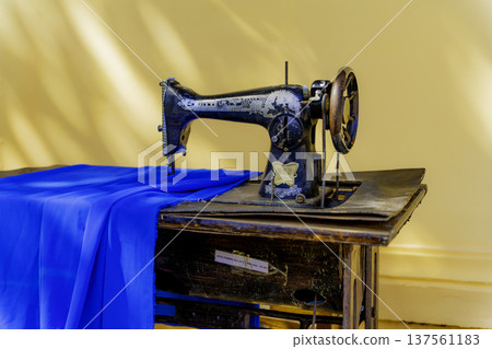 An old sewing machine. 137561183