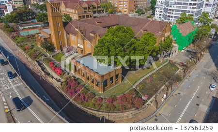 Historic brick school building surrounded by trees in Hong Kong March 8 2026 Historic brick school building surrounded by trees in Hong Kong March 8 2026 137561259