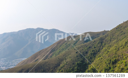 Tai To Yan mountain ridge rising above lush forests March 7 2026 Tai To Yan mountain ridge rising above lush forests March 7 2026 137561289