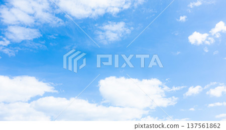 A simple landscape of blue sky and white clouds 137561862